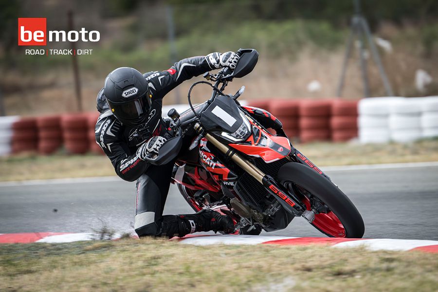 Chris Northover knee down on track with a Ducati Hypermotard 698 Mono
